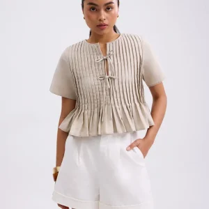 Pintuck Notched Peplum Top